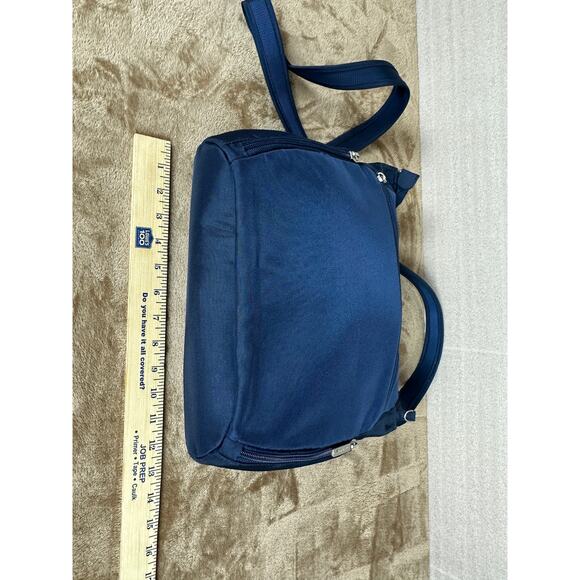 Travel on antitheft classic Crossbody bucket bag navy blue new without tags 
￼ - Picture 9 of 10